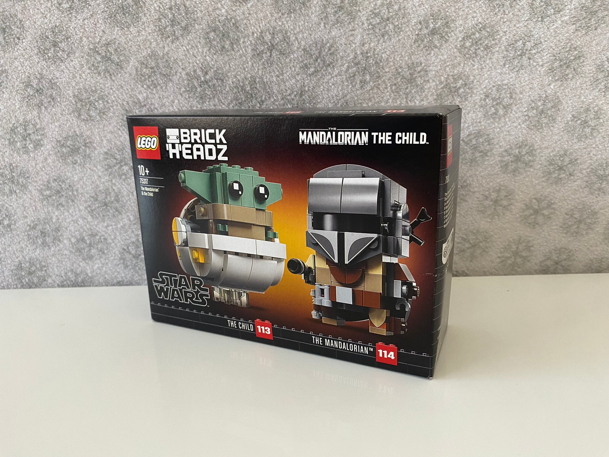 LEGO BrickHeadz Star Wars Der Mandalorianer und das Kind (75317), authentische Nachbildung von Din Djarin und Grogu, Blasterpistole und Blastergewehr, das Kind in schwebender Wiege mit verstellbaren Ohren.